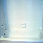 Surface Genie bathroom bathtub after regrouting and finishing